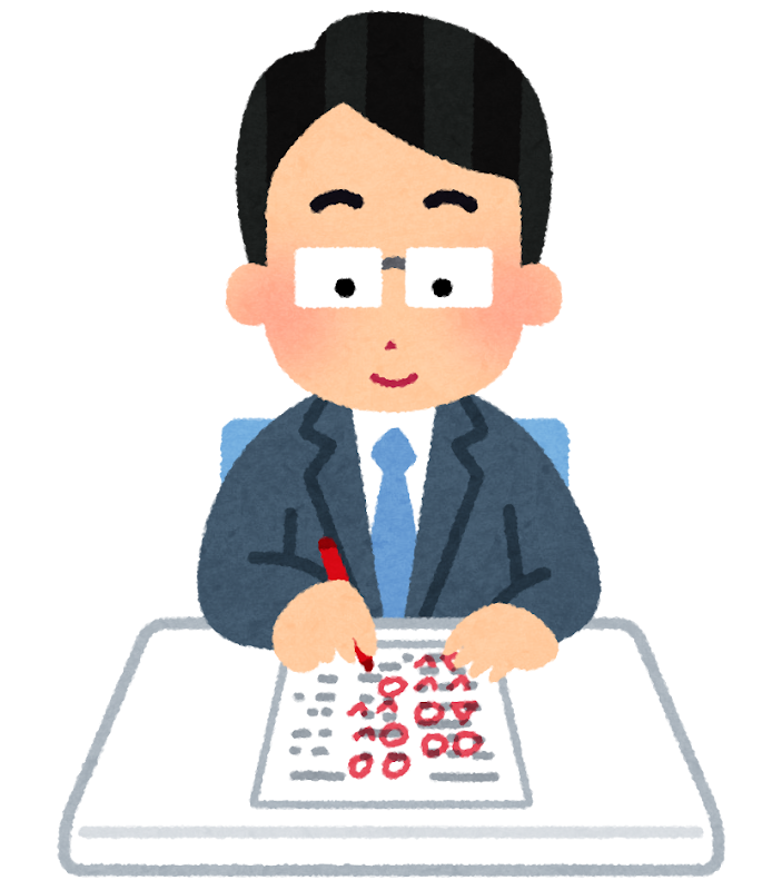 採点された答案を前に、間違いの原因を分類する